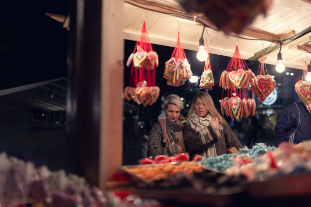 istock Lesbian couple on Christmas market 1276396814