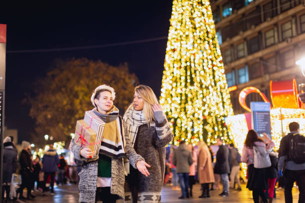 istock Lesbian couple on Christmas market 1276396866