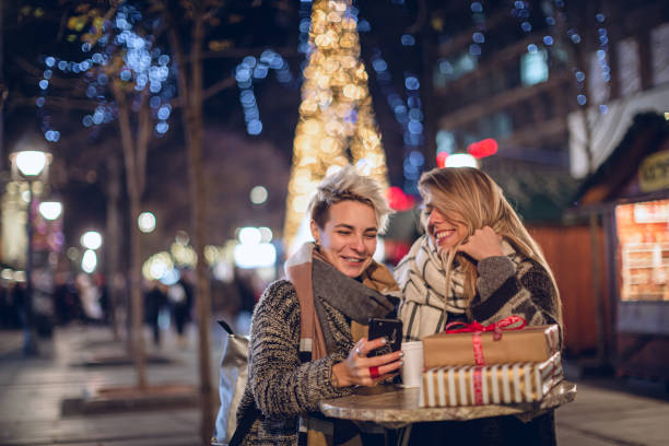 istock Lesbian couple on Christmas market 1276396903