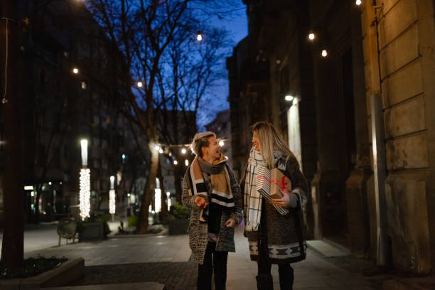 istock Couple enjoying the Christmas night walk 1276396941