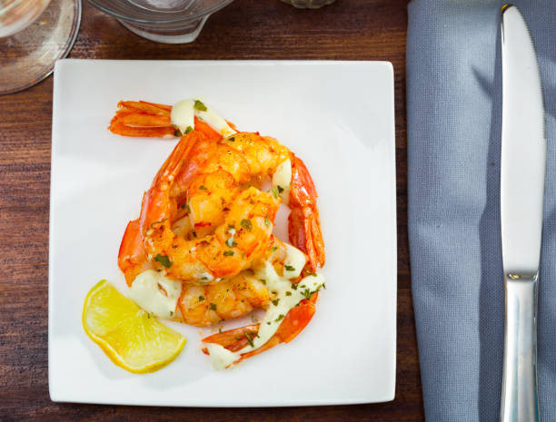 istock Grilled shrimps with garlic sauce 1276397326