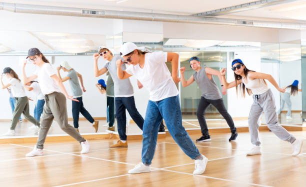 istock Boy and girls having dancing class 1276399881