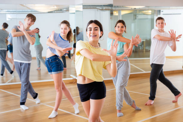 istock Teenagers are dancing hip hop in dance studio 1276400473