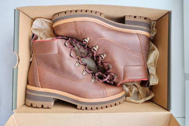 istock New womens leather brown waterproof winter boots in box 1276400582