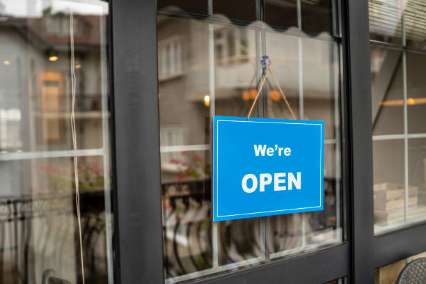 istock We're open Sign on a restaurant or cafe entrance 1276401324