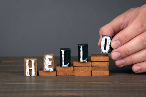 istock HELLO. Greeting, invitation, career and service concept. Alphabet letters on steps 1276401349