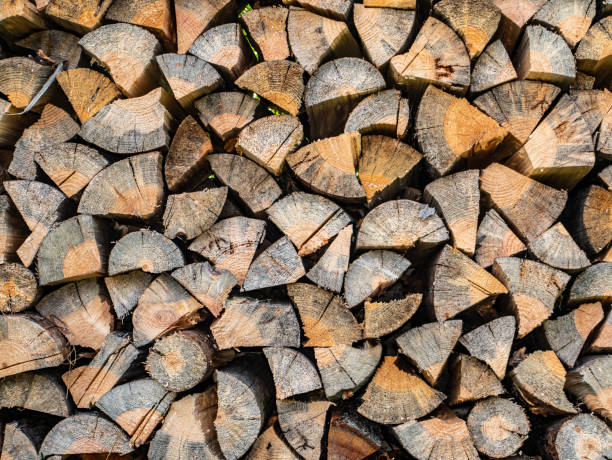 istock Wood chopped with an ax for heating a rural house. 1276402307