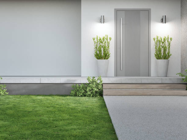 istock New house with gray door and empty white wall. 1276402460