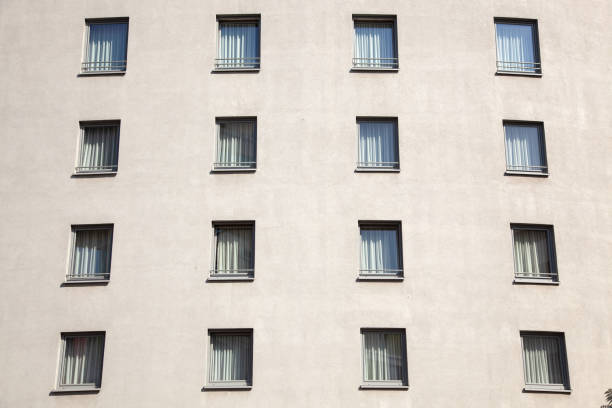 Low Angle View Of Building Facade With Rows Of Windows
