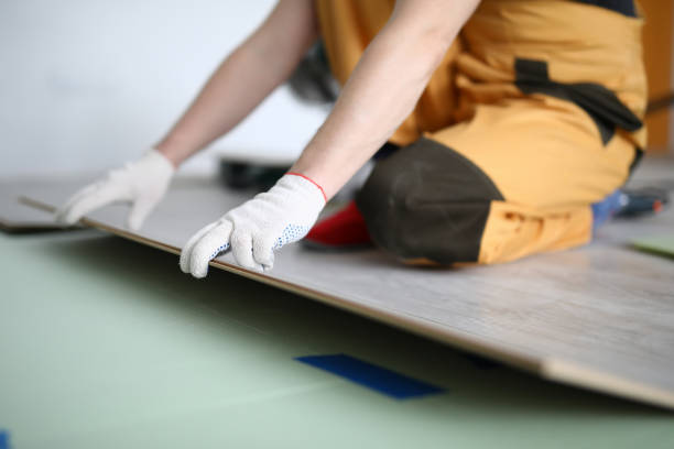 istock Happy craftsman working in apartment 1276403835