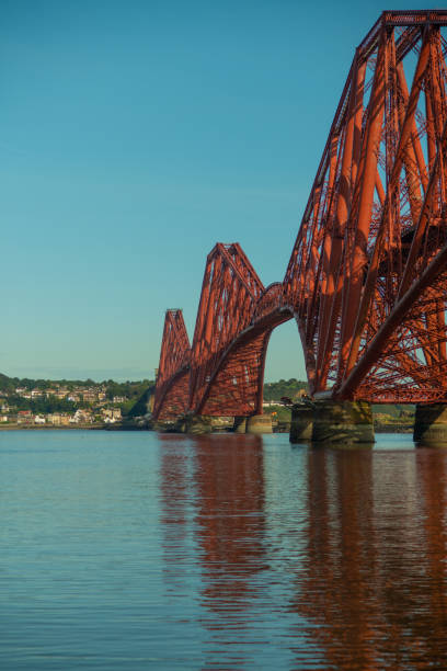 view across the firth of forth on a sunny day from south queensferry with the forth rail bridge_ - vertical lift bridge imagens e fotografias de stock