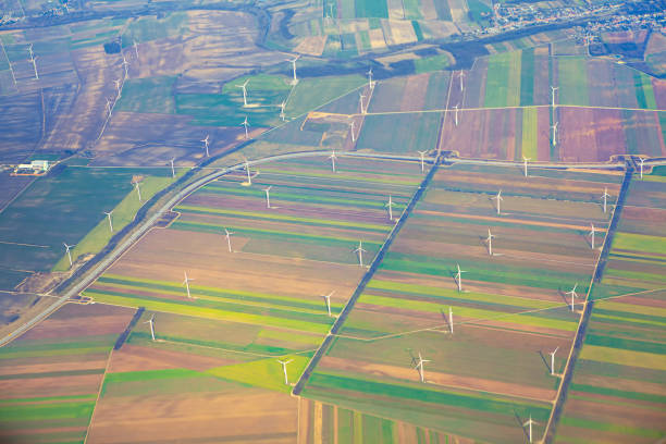 istock Wind turbines on the green fields , aerial view 1276406768