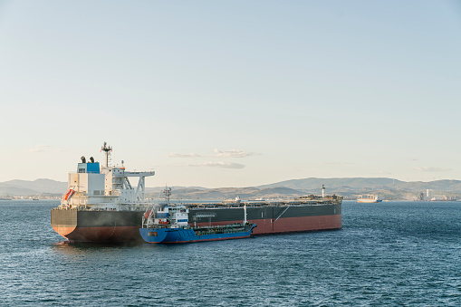 oil fuel Tanker leaving Asian liquefaction plant to deliver natural gas to consumers.