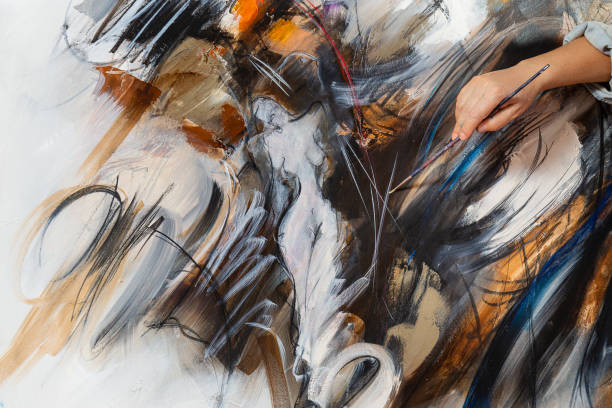 Fine art painter paints on canvas in the studio, Detail from Artist's canvas