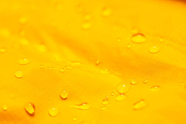 istock Water drops on the orange waterproof fabric 1276408460