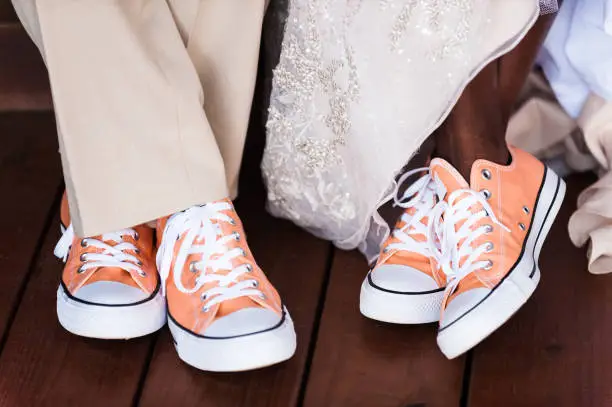 Peach Colored Wedding Shoes for both Bride and Groom on their wedding day.