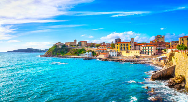 Piombino view from piazza bovio.Tuscany Italy Piombino seafront view from piazza bovio. Maremma Tuscany Italy Europe. livorno stock pictures, royalty-free photos & images