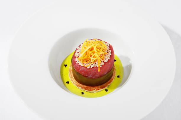 istock Bluefin tuna and yellow sauce 1276410061