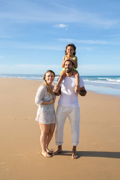 istock Happy young parents and kid wearing summer clothes 1276410078