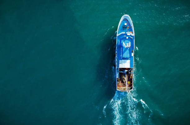 istock Fishing Boat From Above Drone View 1276413093