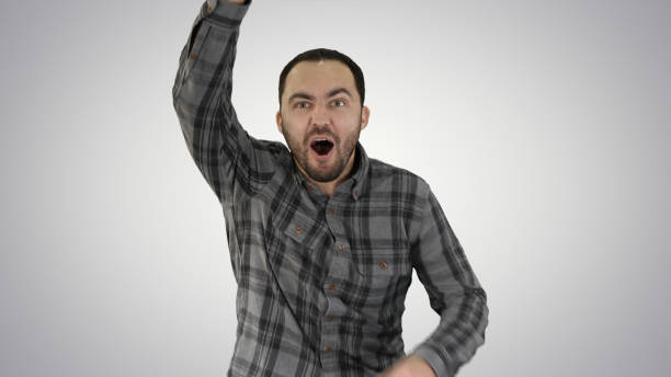 one caucasian man running and calling for someone, trying to get - cheering men shouting silhouette imagens e fotografias de stock