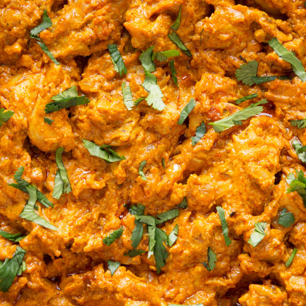 Homemade Chicken Tikka Masala background, top view. Flat lay, overhead, from above. Close-up.