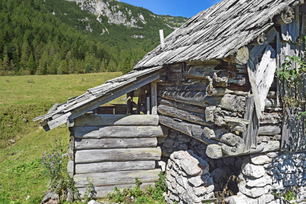 istock Mountain shepherd village with wooden huts 1276426672