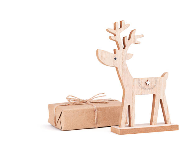 Christmas wooden deer and gift.