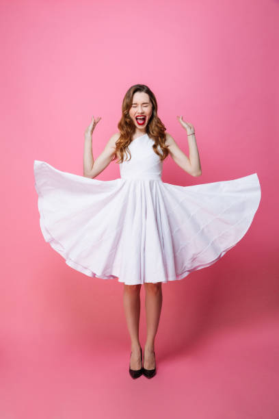istock Screaming young woman with eyes closed. 1276432366