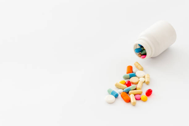 istock Pills bottle with medicines and vitamins, close up 1276432584