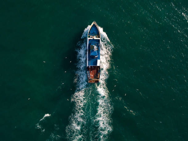 istock Fishing Boat From Above Drone View 1276433020