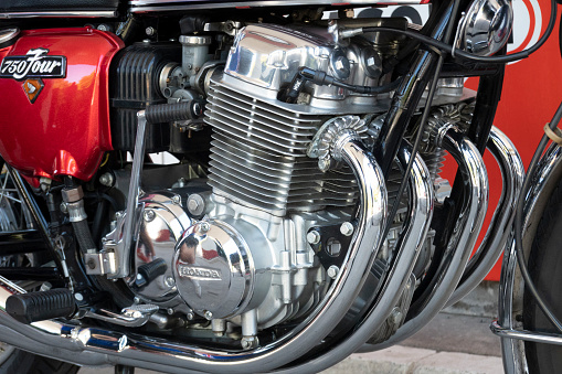 Close up of chrome motorcycle exhaust pipes.