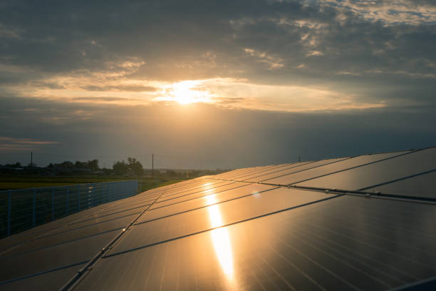 istock solar energy panels and wind turbines 1276434029