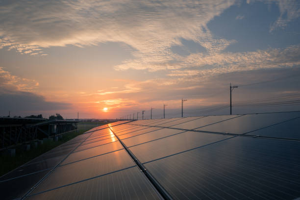 istock solar energy panels and wind turbines 1276434032