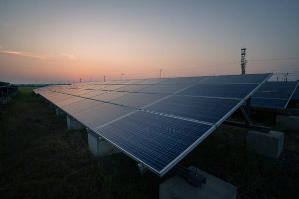 istock solar energy panels and wind turbines 1276434039