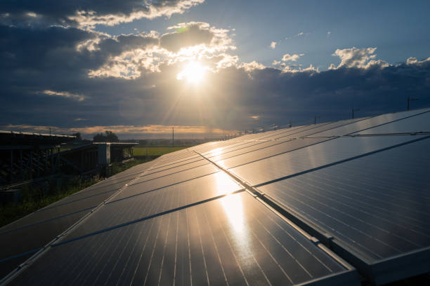 istock solar energy panels and wind turbines 1276434077