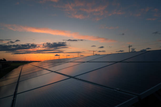 istock solar energy panels and wind turbines 1276434198