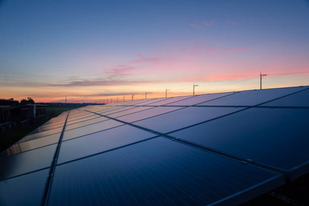 istock solar energy panels and wind turbines 1276434216