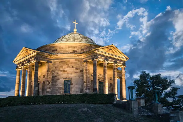 Night shot of the funerary chapel in Stuttgart on the Württemberg with cloudy sky