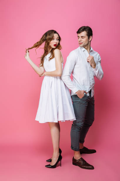 istock Serious loving couple looking at each other. 1276435610