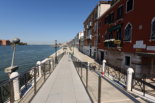 The peer of accademica district in venice city seen on a sunny day. The image was captured during the worldwide coronavirus pandemic.