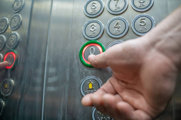 istock The thumb presses the button in the elevator zero floor close-up. The elevator buttons are signed in braille. The concept of inclusion. 1276438581