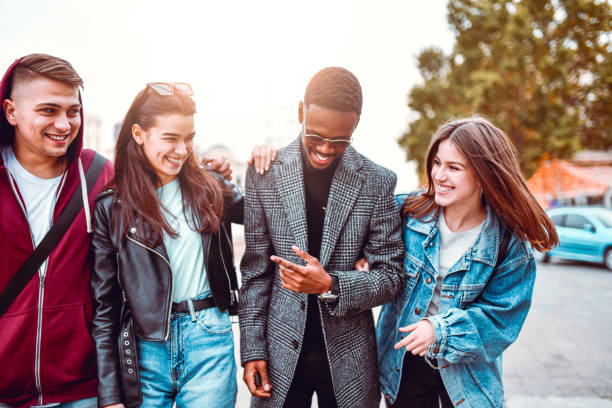 istock Friends Taking A Walk In City After School 1276439026