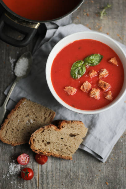 istock Homemade Tomato Soup with Bread Croutons 1276439464