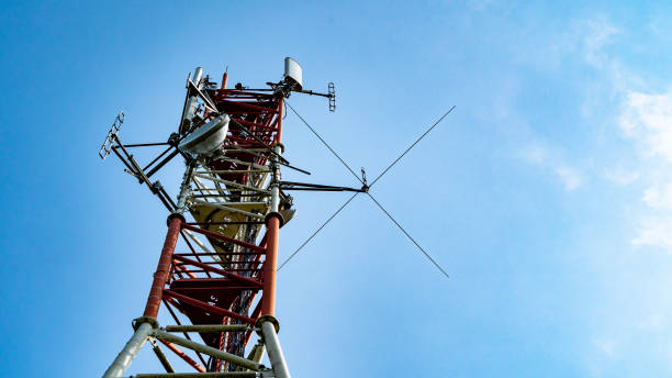 istock Red and white telecommunications tower with various transmission equipment 1276442861