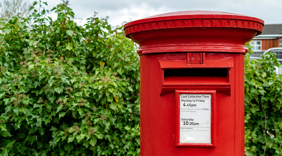 Red and green mailboxes near post office. Darjeeling, India.