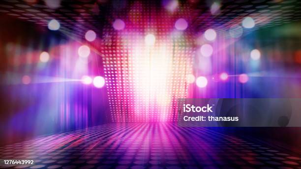 Blurred Empty Theater Stage With Fun Colourful Spotlights Abstract Image Of Concert Lighting Illumination Background Stock Photo - Download Image Now