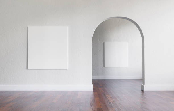 istock Big, empty interior with large mock-up canvases and circular arc entrance to another space. Minimalistic style with full of empty space. Shallow depth of field. 3D render. 1276444908