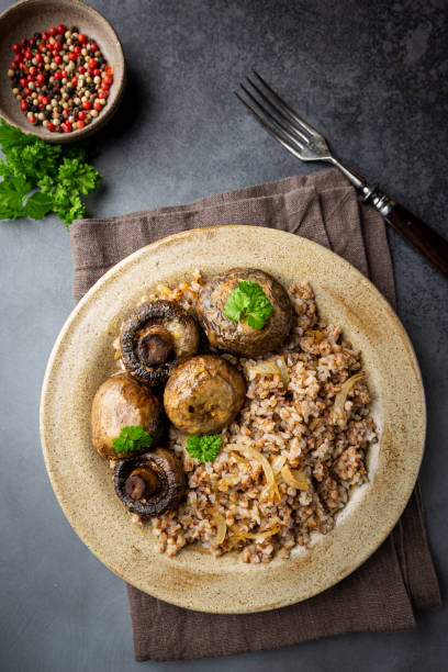 istock Buckwheat porridge with mushrooms 1276446544