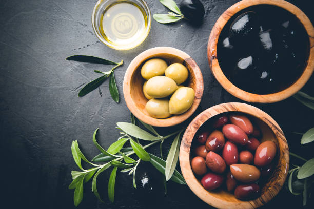 istock Black and green olives 1276446663